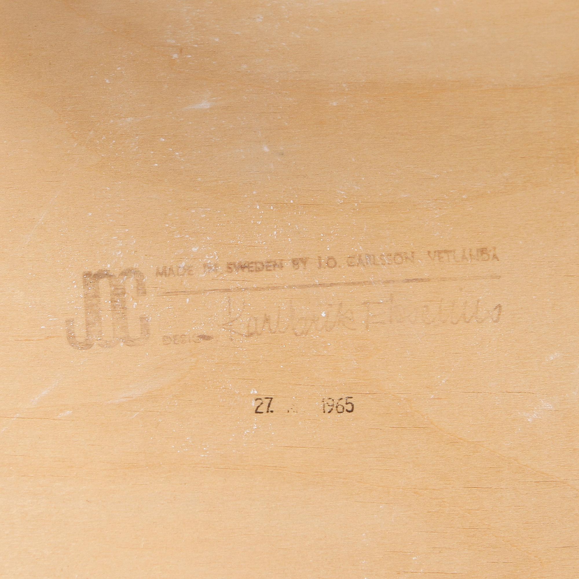 Four chairs by Karl-Erik Ekselius.