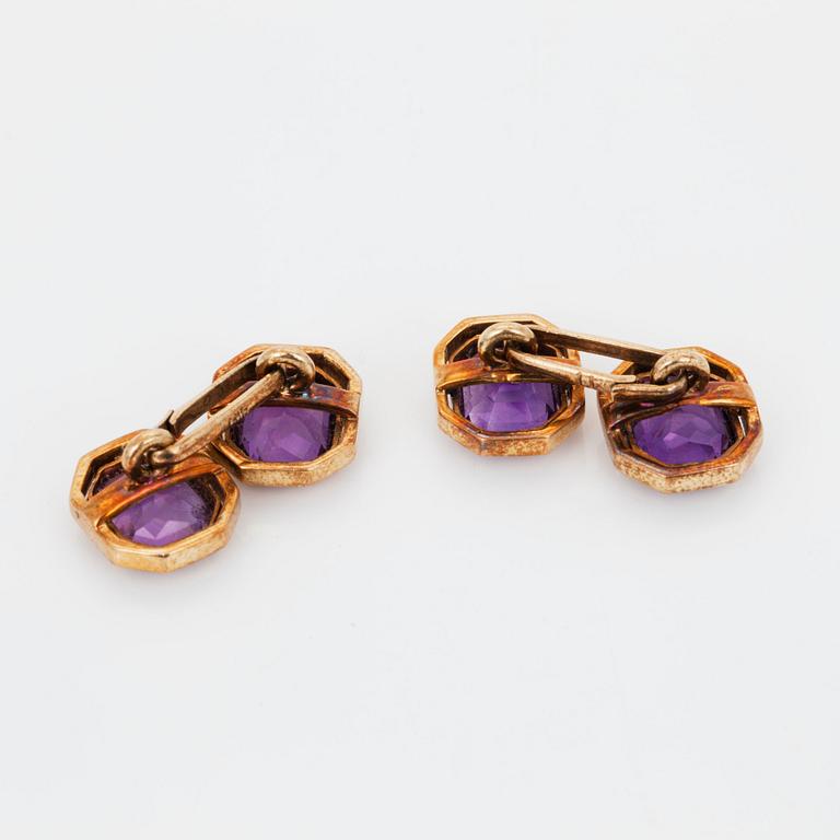 A pair of amethyst cufflinks.