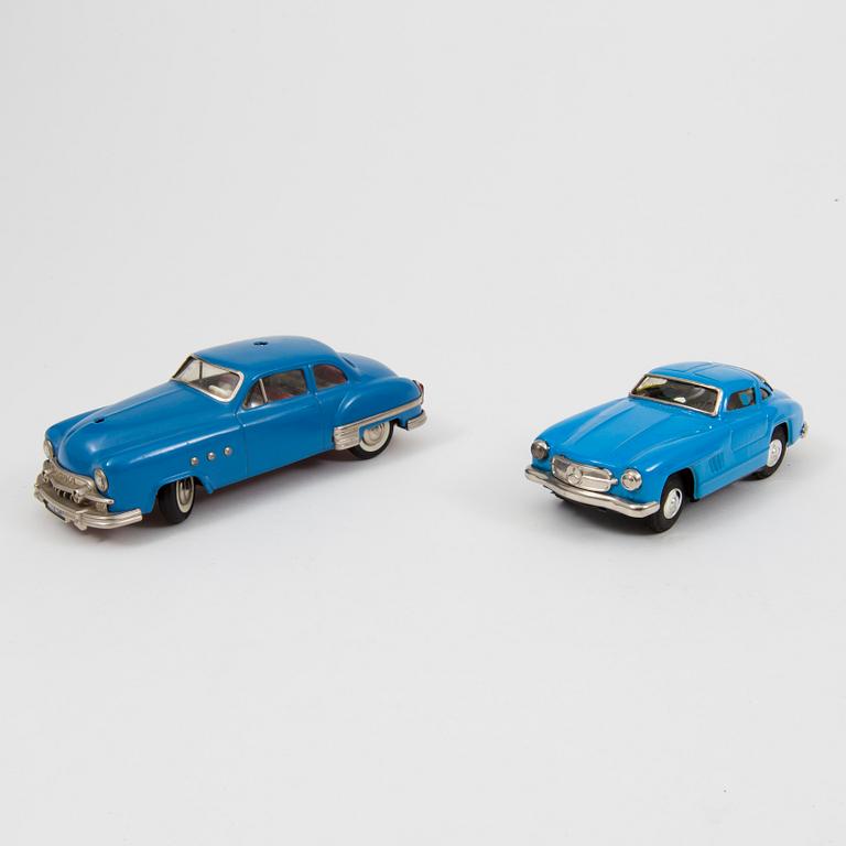 Two tinplate cars by Schuco and Kato Sairen German and Japan 1950s.