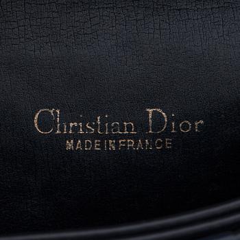 CHRISTIAN DIOR, a blue monogrammed canvas shoulder bag and belt.