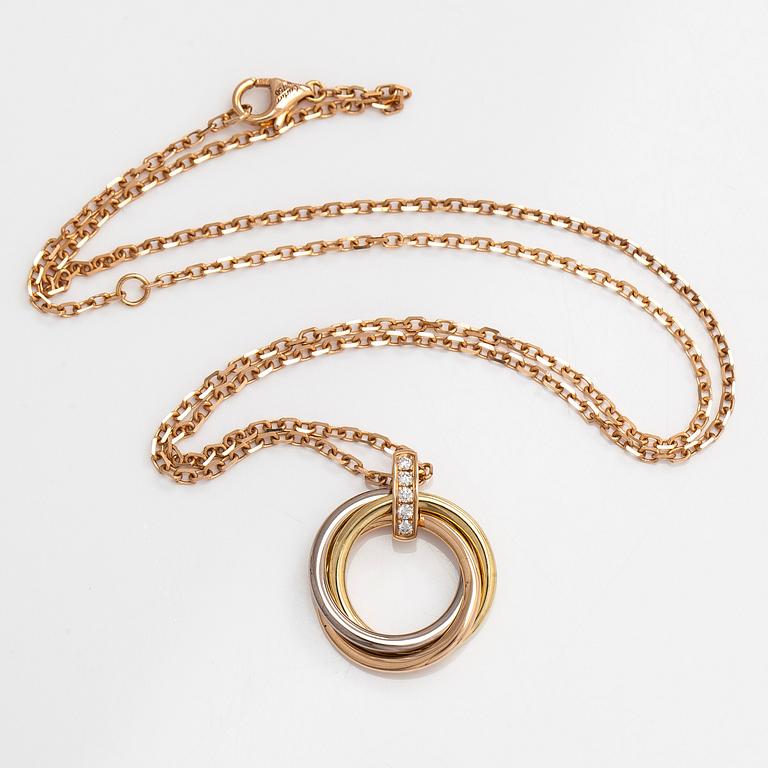Cartier, an 18K gold 'Trinity Pendant' necklace with brilliant-cut diamonds.