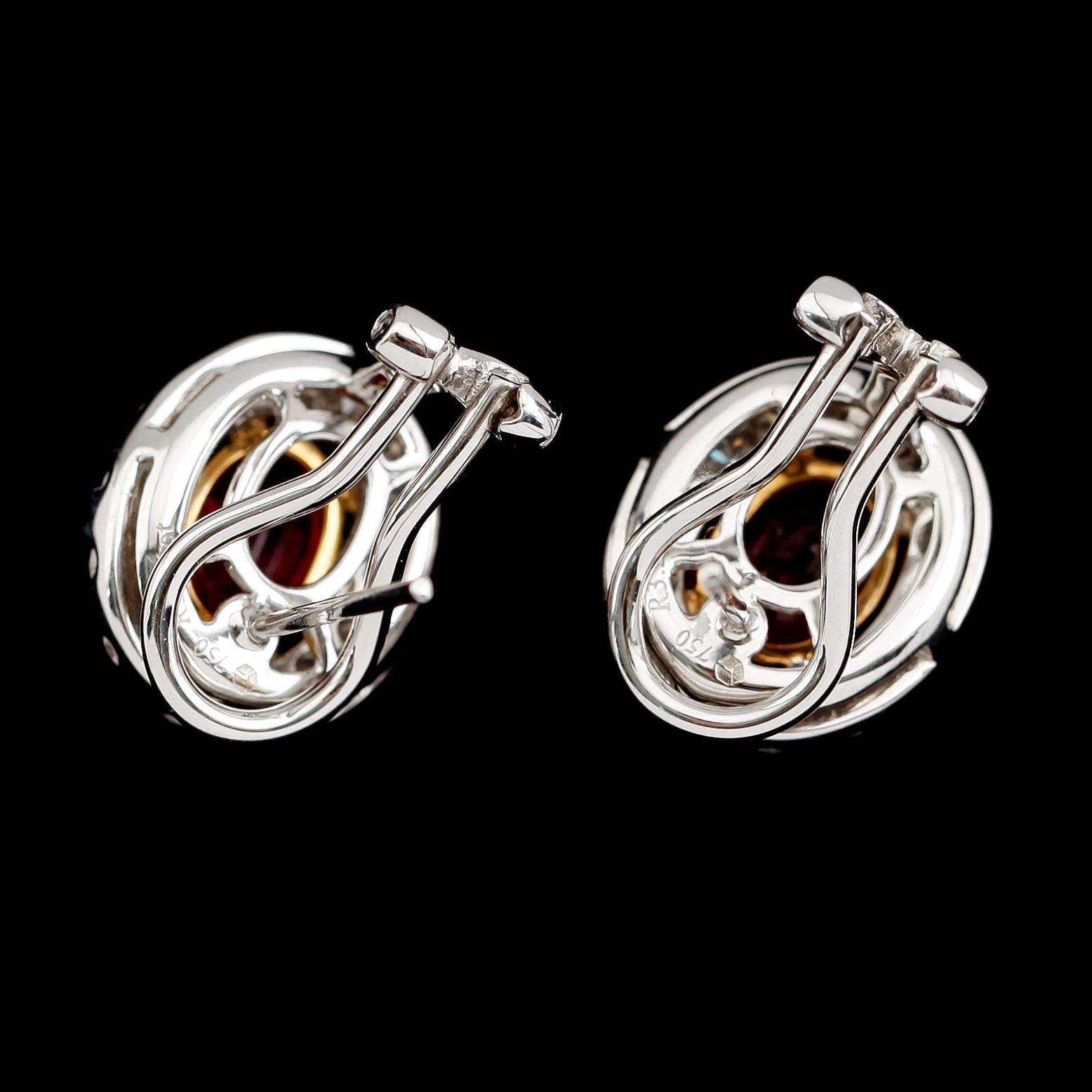 ÖRHÄNGEN, 1 par, 18 k vit/gult guld, rubiner tot ca 3.24 ct, briljantslipade diamanter tot ca 1.35 ct.