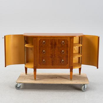 A mahogany veneered dresser, mid 20th Century.