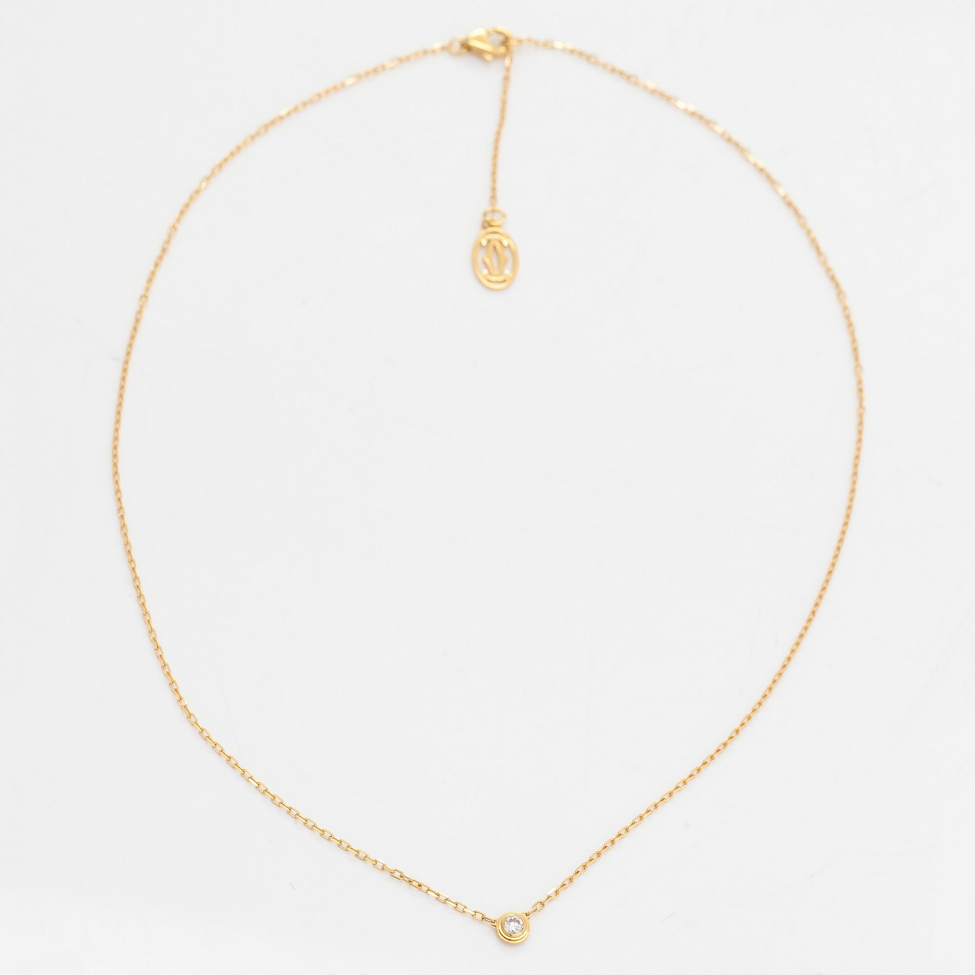 Cartier, an 18K gold 'd'Amour' necklace, with a ca 0.05 ct brilliant-cut diamond.