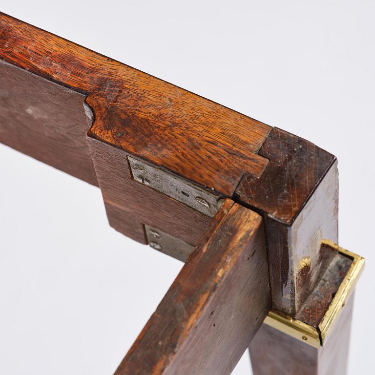 A Gustavian 'concertina action' mahogany games table by Georg Haupt (master in Stockholm 1770-84).
