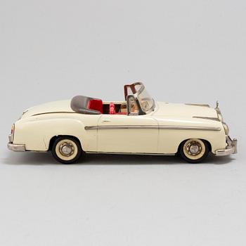 A mid 20th century toy car, Shuko 5720 Elektro Mercedes.