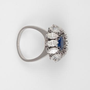 A untreated sapphire, 1.75 cts, and navette-cut diamond, 4.10 cts ring.