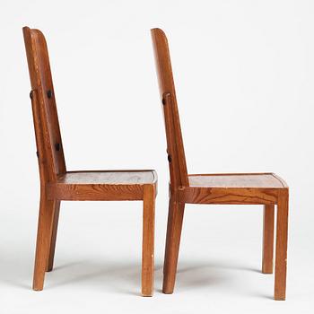 Axel Einar Hjorth, a pair of stained pine 'Lovö' chairs, Nordiska Kompaniet, Sweden 1930s.