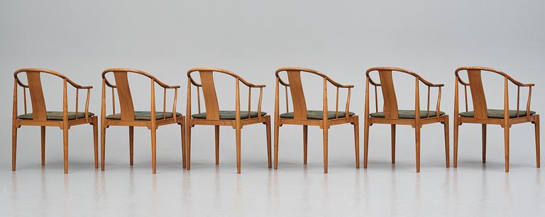 Hans J. Wegner, a set of 6 walnut 'China Chairs', Fritz Hansen, Denmark 1967.