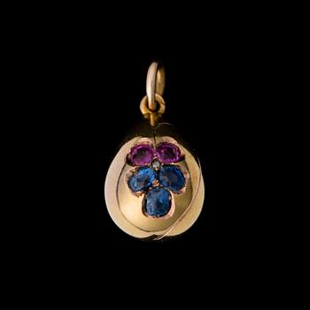 A PENDANT, facetted rubies and sapphires, 14K (56) gold. Russia, c. 1900.