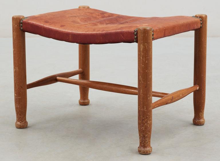 A Josef Frank mahogany and red leather stool, Svenskt Tenn, model 686.