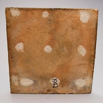 A stoneware relief signed Rut Bryk -46.