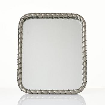 Estrid Ericson, a pewter framed mirror model "A 2518", Firma Svenskt Tenn, Stockholm, 1947.