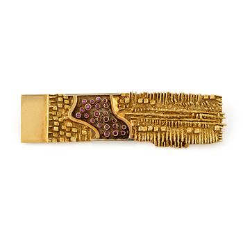 538. Arnaldo Pomodoro, a brooch, 18K gold with rubies, Italy 1962.
