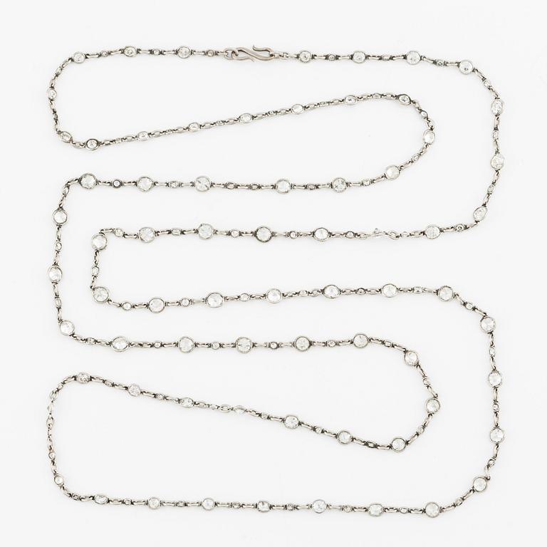 An antique platinum diamond long chain.