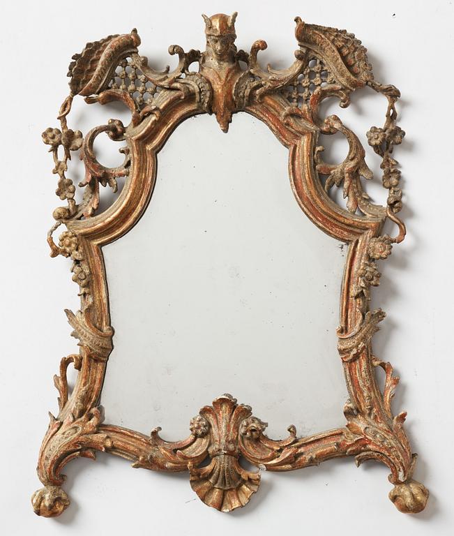 A gilt Rococo mirror, 18th Century.