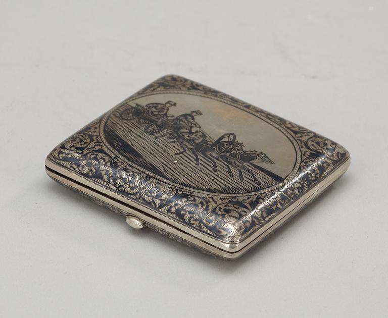 A RUSSIAN PARCEL-GILT AND NIELLO CIGARETTE-CASE, makers mark possibly of Gustav Klingert, Moscow 1888.