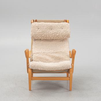 Bruno Mathsson, a 'Pernilla' armchair, Dux, late 20th century.