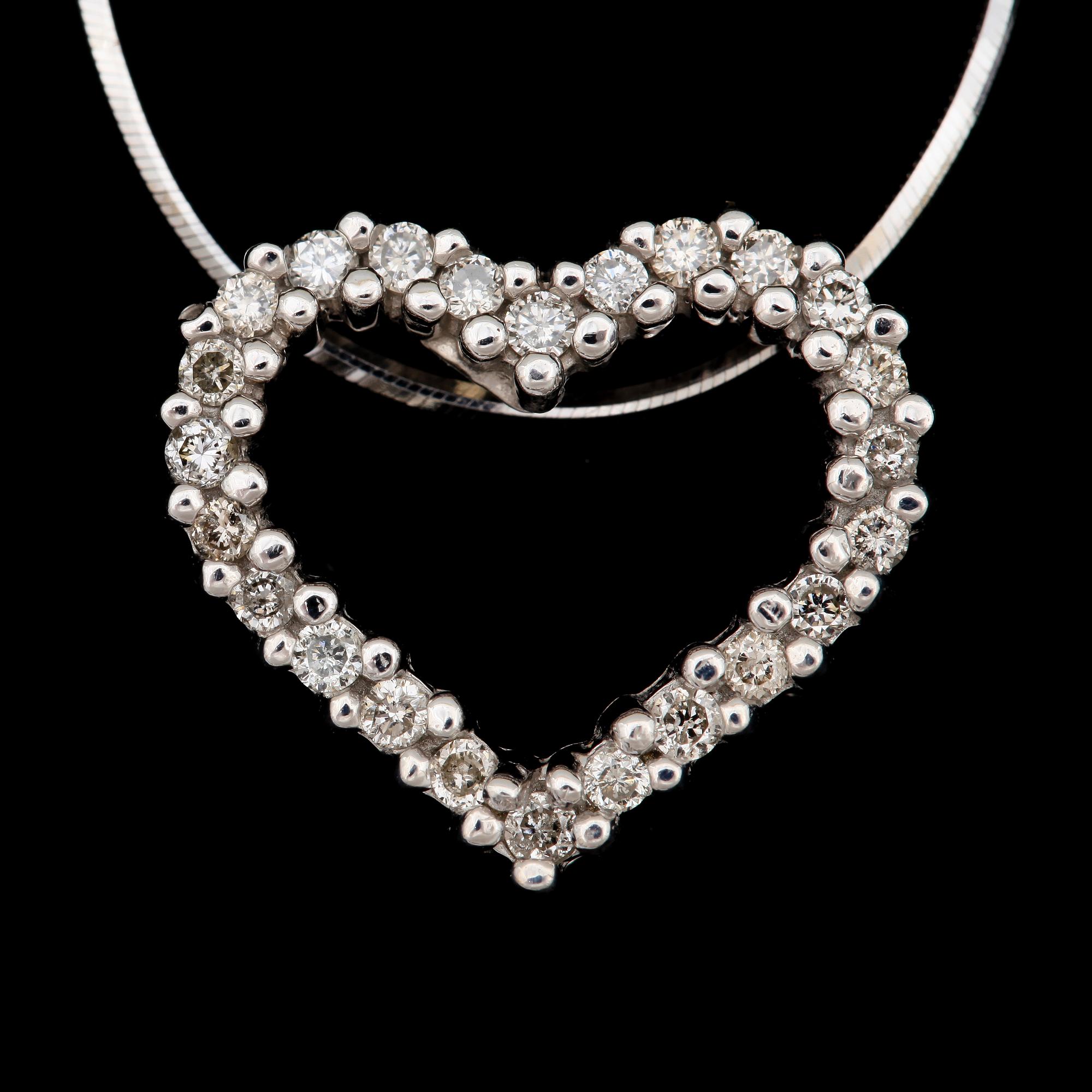 HALSSMYCKE, 14k vitguld med briljantslipade diamanter tot ca0,50ct. Vikt 3,4g.