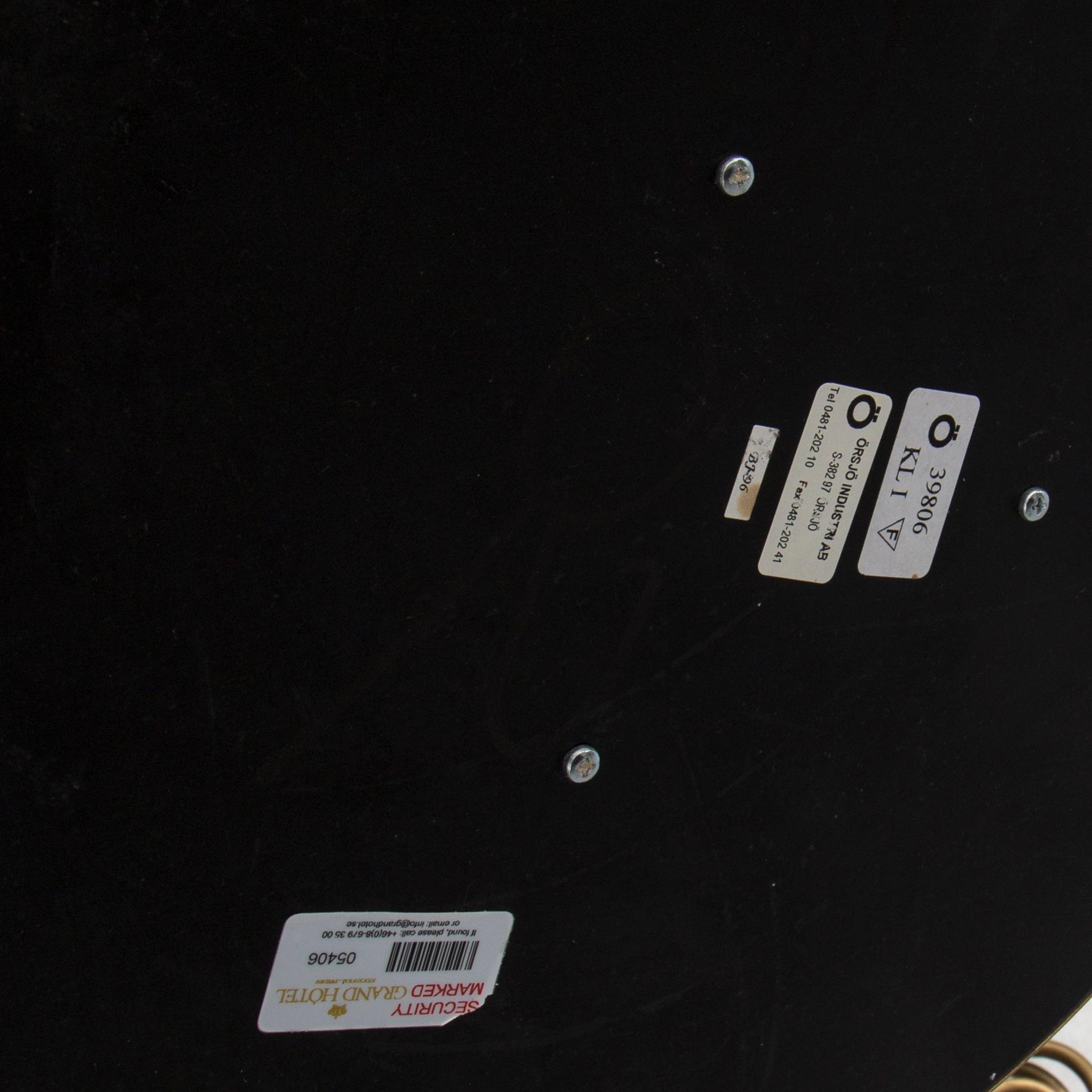 A brass and leather floor light by Örsjö industri, 21st century.