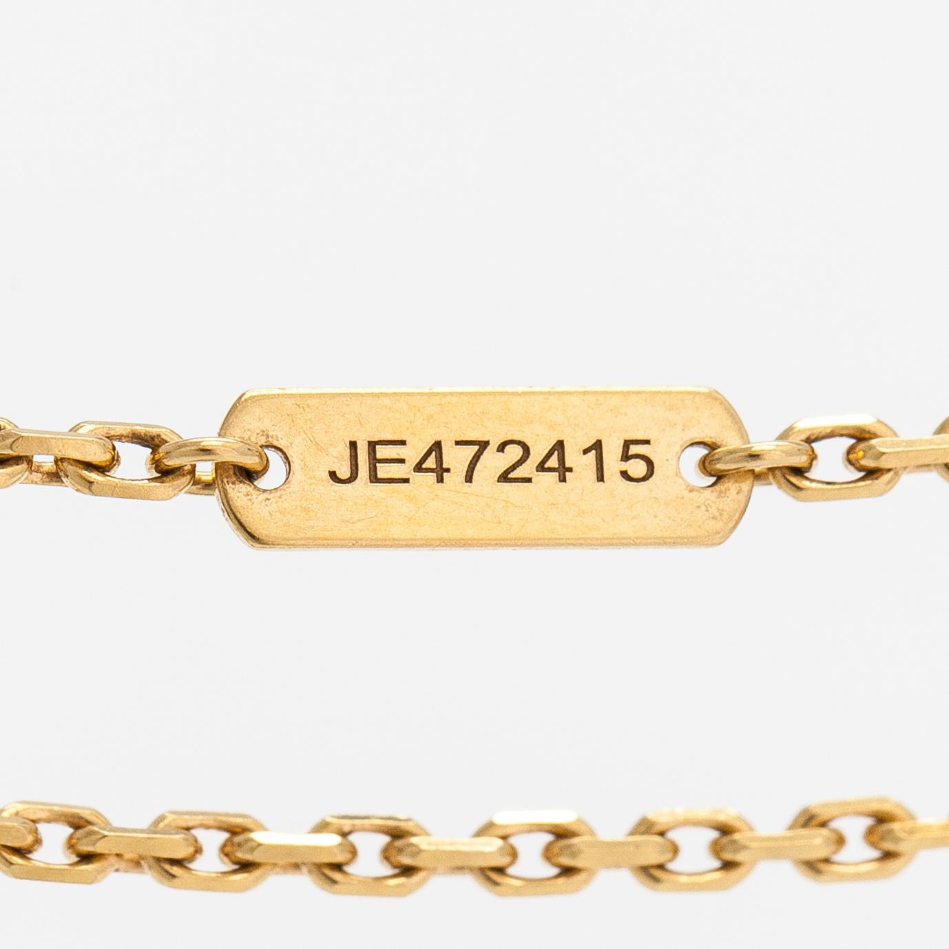 Van Cleef & Arpels, An 18K gold and malachite "Magic Alhambra" necklace. Marked VCA, JE472415.