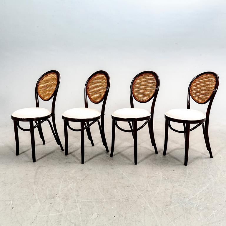 A set of four stained wood chairs, first half of the 20th century.