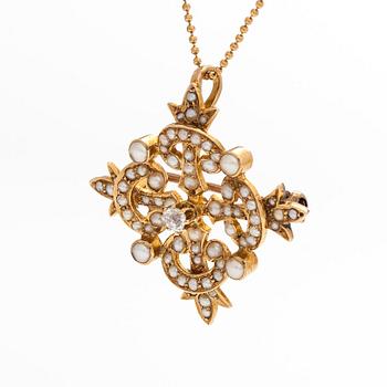 Rintaneula/riipus, kultaa siemenhelmet ja vanhahiontainen timantti, ketjulla.