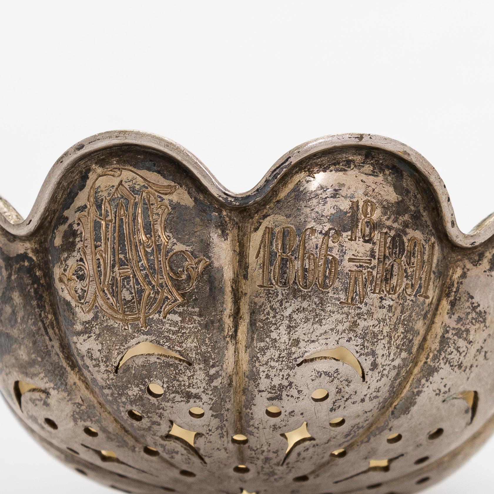 Grachev, a parcel-gilt silver sprinkle spoon, Saint Petersburg, around 1891.