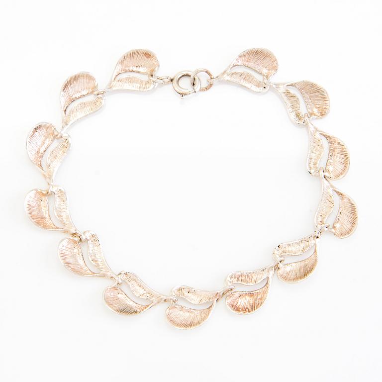 A set of sterling silver necklace and bracelet. Valo-koru, Turku.