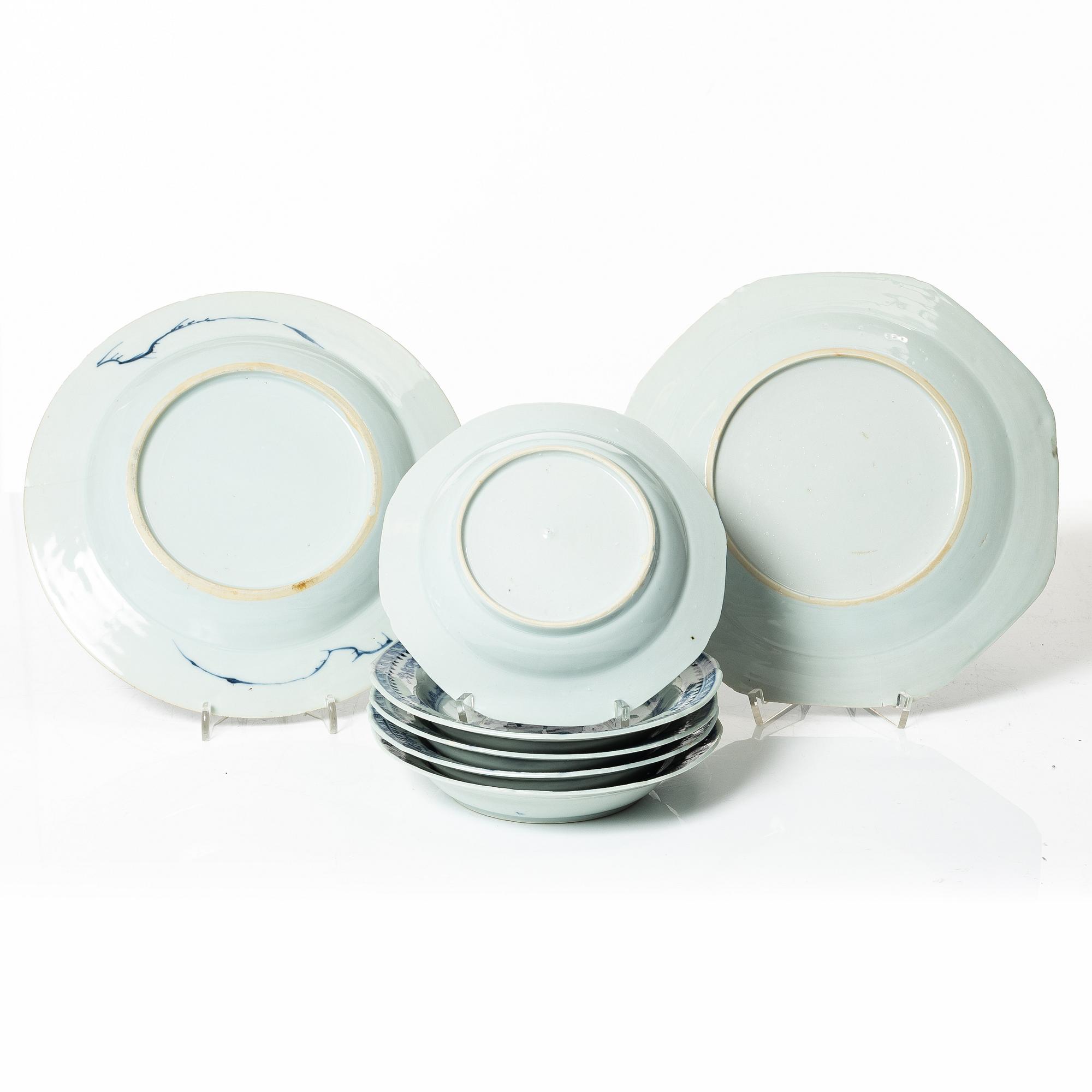 A group of seven Chinese blue and white porcelain plates and five dessert dishes, Qing dynasty, Qianlong (1736-95).