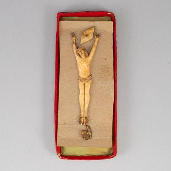 An 18th century bone figure of Christ.