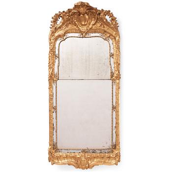 A Swedish rococo carved giltwood and gesso mirror, later part of the 18th century.