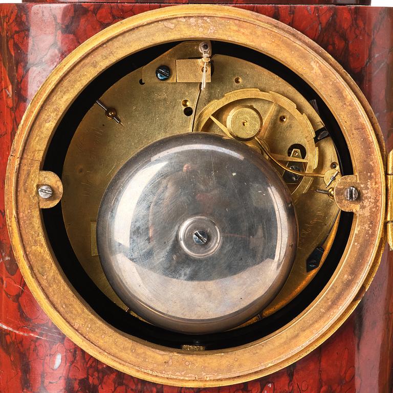A French Empire 19th century gilt bronze mantel clock signed Lamiral.