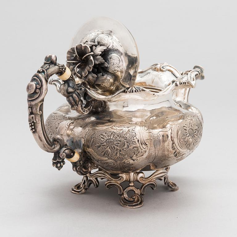 A silver teapot, unknown maker's mark F.G, assay master mark Dimitri Ilyich Tverskoy, Saint Petersburg, Russia 1844.