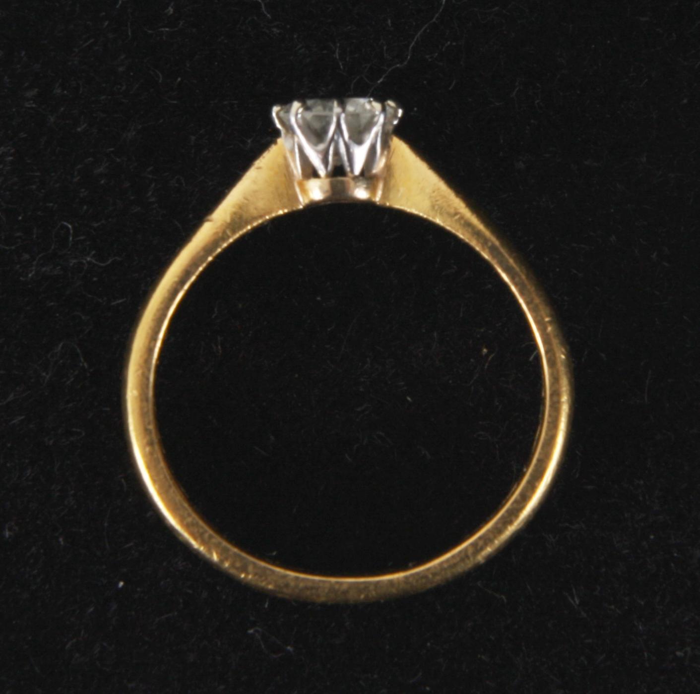 RING, 23K guld med briljant ca 0,25ct.