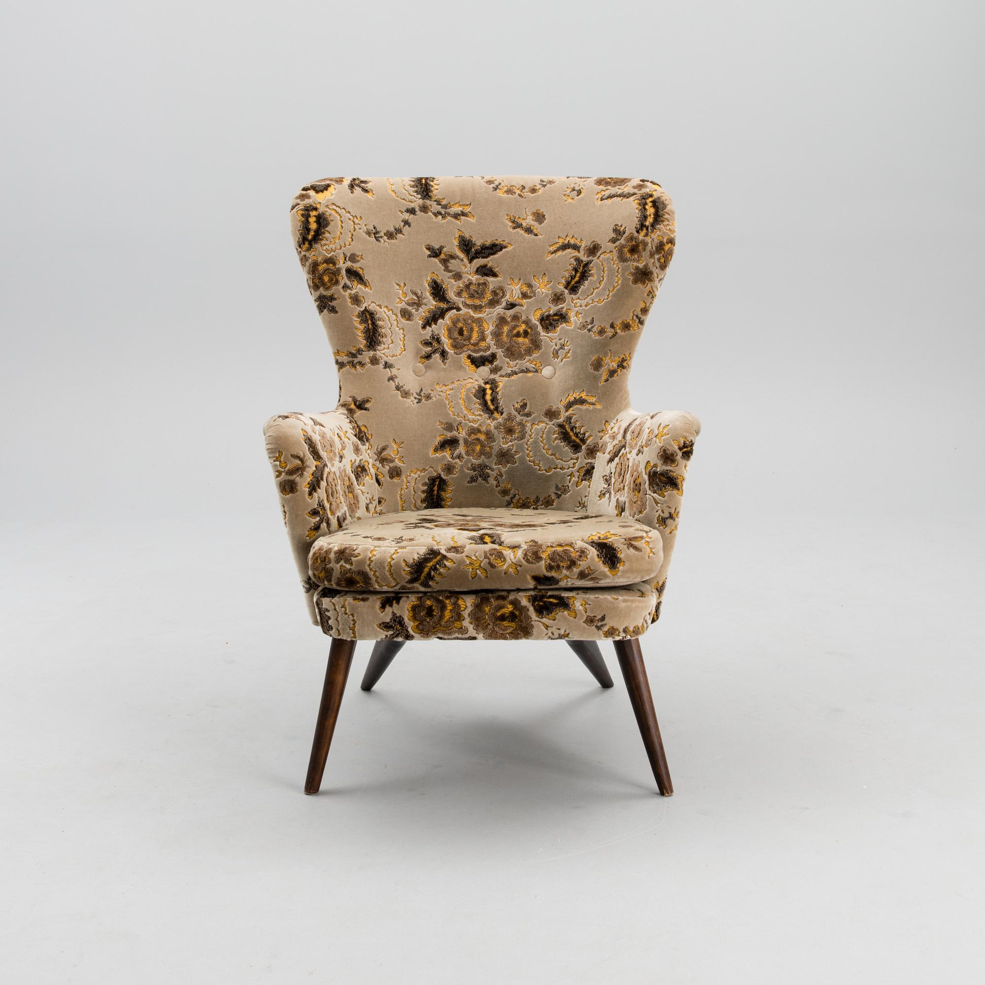 A mid-20th century armchair for Puunveisto Oy - Träsnideri Ab.