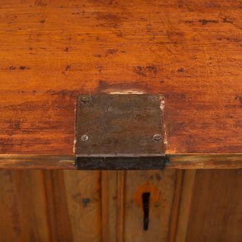 a painted wooden cabinet from the 19th century.