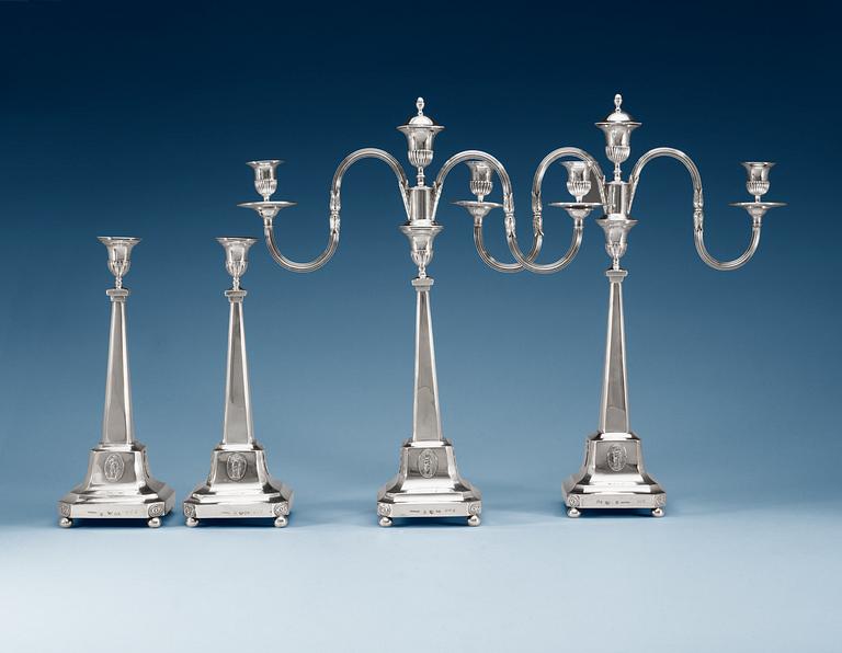 A pair of 18th century silver candelabra and a pair of candlesticks, makers mark of Pehr Zethelius, Stockholm 1796.