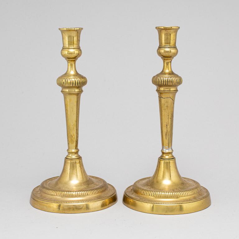 A pair of late 18th century candlesticks.