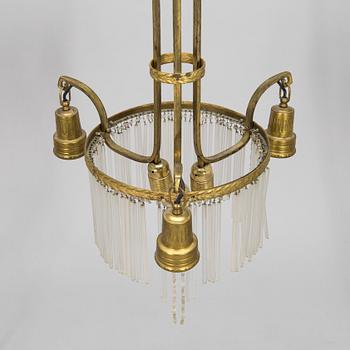 An Art Nouveau ceiling lamp, circa 1900.
