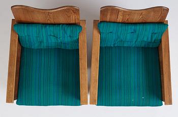 Axel Einar Hjorth, a pair of "Utö" stained pine armchairs, Nordiska Kompaniet 1930s.