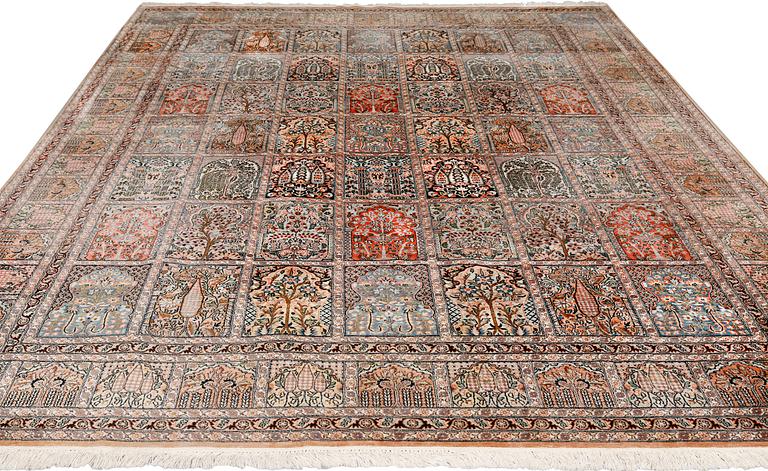 A silk Kashmir carpet, approx. 327 x 243 cm.