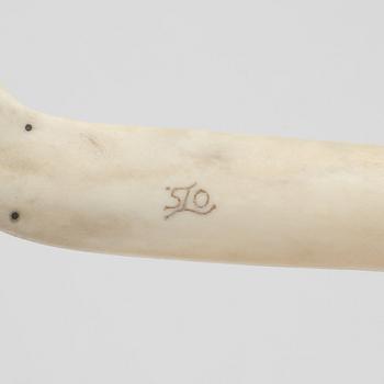 Olof Tomas Svonni, a reindeer horn knife, signed.
