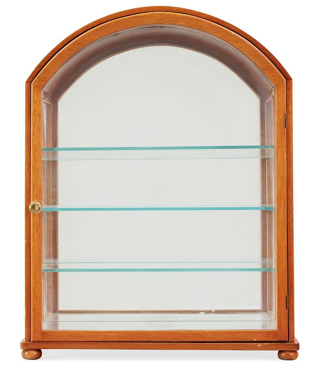 A Josef Frank mahogany showcase cabinet by Svenskt Tenn, model 2070.