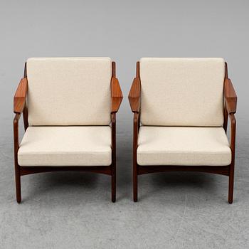 H Brockmann-Petersen, a pair of Danish teak easy chairs, 1950's/60's.