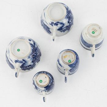 A group of thirteen cups, a bowl and a cup holder, four saucers, partly China and 18th century,