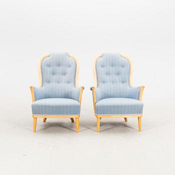 Carl Malmsten, a pair of Vår fru birch armchairs OH Sjögren alter part of the 20th century.