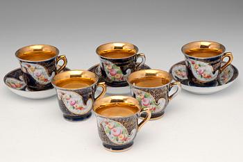 100. PORCELAIN OBJECTS (6 CUPS, 3 SAUCERS, 1 JUG).