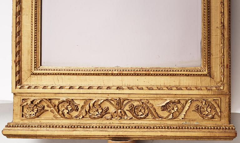 A late-Gustavian giltwood mirror, Stockholm, late 18th century.