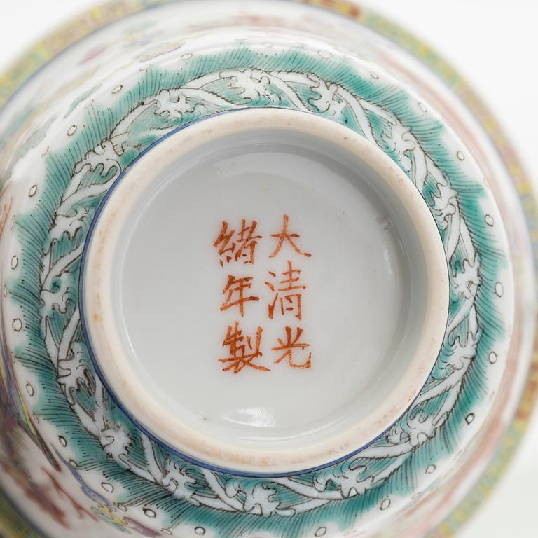 A set of seven bowls of which three with lids and a small famille rose jar, including Guangxu mark, China, circa 1900.